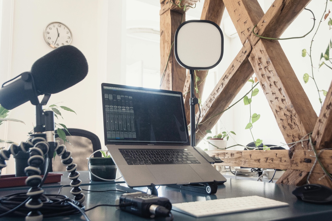 Local voice AI dictation setup with microphone and laptop